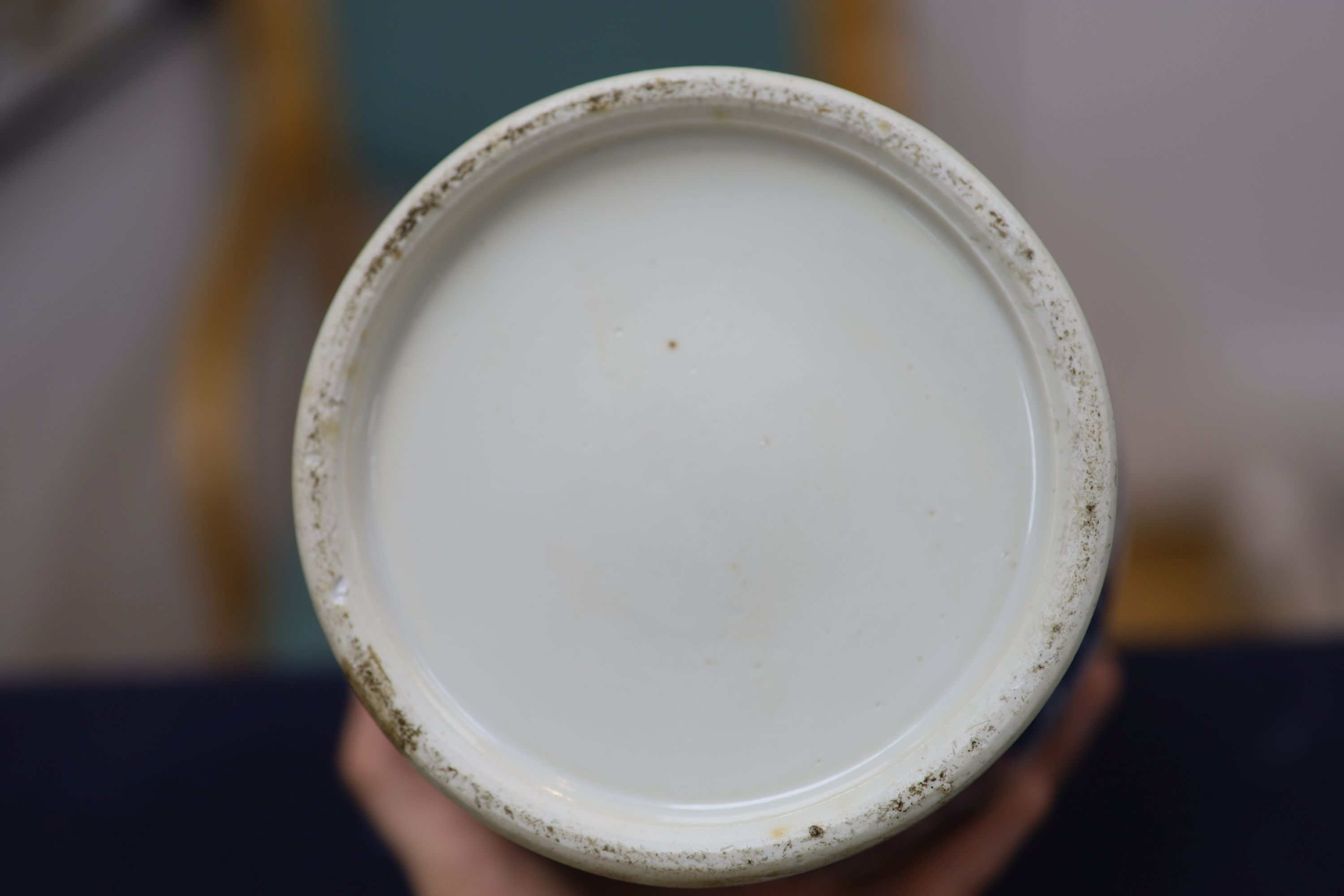 A 20th century Chinese blue and white jar and cover with prunus decoration, height 25cm